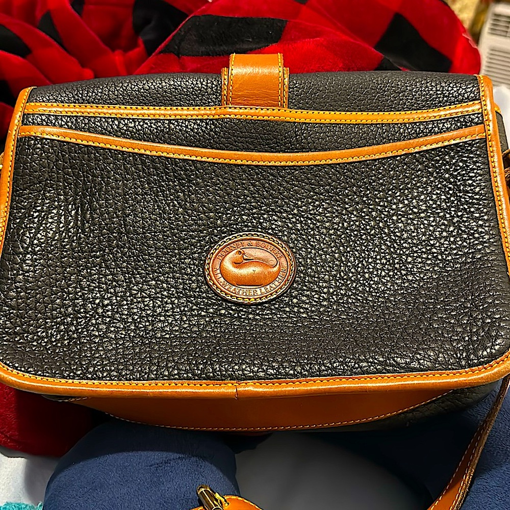 This is a  Vintage Dooney & Burke handbag in excellent condition.